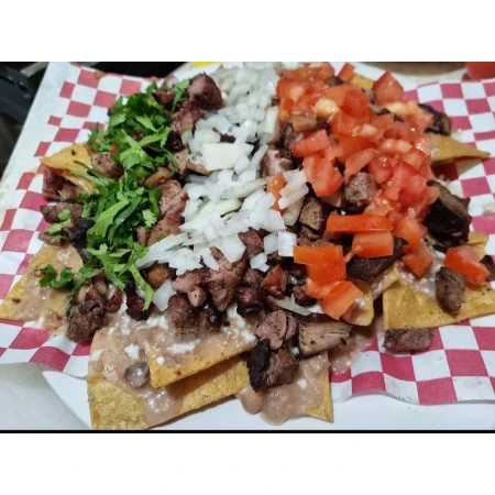 Tacos al carbón Flores en Santa Cruz del Valle